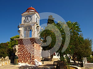 Bell clock tower with blue sky background in Skiathos Island, Greece