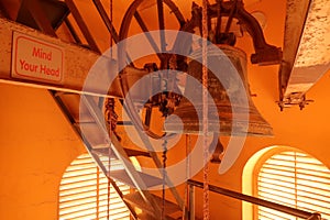 Bell inside the staircase of the bell tower of the St John the Baptist Church in Madaba, Jordan