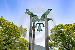 Bell of Nagasaki Statue in Peace Park, Symbol of World Peace in Atomic Bomb Park, Japan