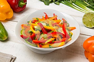 Bell pepper cucumber salad. Selected focus.