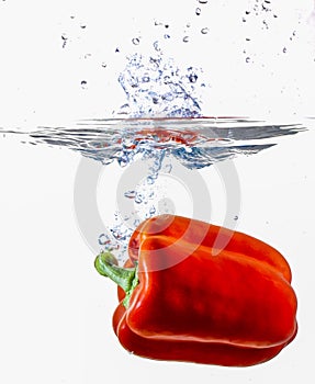 Bell Pepper Dropping Into Water