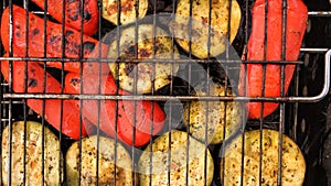 Bell pepper and eggplant roasted on the grill, close-up. Grilled vegetables