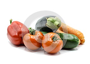 Bell pepper, tomato, eggplant, zucchini, carrot isolated on white background