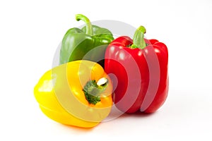 Bell peppers over white background, Green, yellow and red Fresh