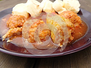 Stuffed peppers, minced meat, rice, tomato sauce, dumplings