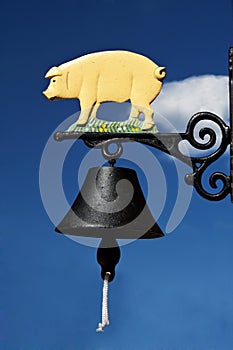 Bell with piglet