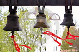 The bell ringer ringing the church bells. photo