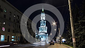 The bell tower of the Assumption Cathedral Uspenskiy Sobor day to night timelapse hyperlapse in Kharkiv, Ukraine