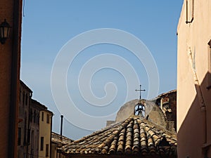 Bell tower and roof of the bobeda de la hermita de san juan de cabaces, tarragona, spain, europe photo