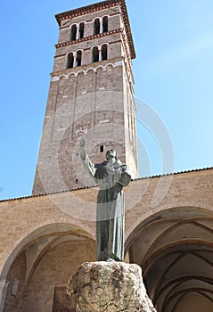 bell tower of the cathedral and the statue of Saint Francis of A