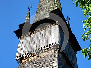 The bell tower of Church of the Archangels Michael and Gabriel in Surdesti, ROMANIA