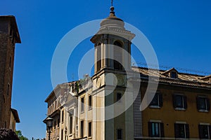 The bell tower of a church. The arches that enclose the bells are visible.