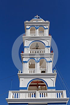 Bell tower of the church of Holy Cross in Perissa