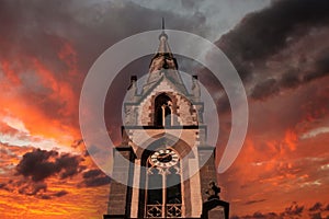 bell tower of the church of saints filippo and giacomo in the village of predazzo trentino alto adige