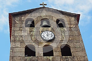 Ell tower of the church of San Bernardo, with three bells photo