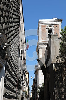 Bell tower of the church of Santa Chiara in Spaccanapoli street photo