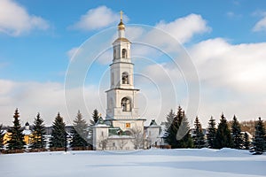 Bell tower and church shop in the village of Borodino