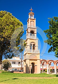 The bell tower of the church in the village of Pilon (Pylonas) photo