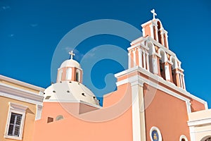 Bell tower and dome of a church at Oia village, Santorini island