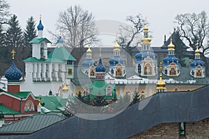 Bell tower and domes of the Syato-Uspensky Pskovo-Pechorsky monastery. Pechory, Pskov region. Russia