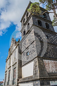 Bell tower and the facade of the church of Our lady of Estrela in Ribeira Grande, São Miguel - Azores PORTUGAL