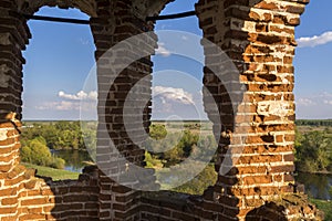 Bell tower inside the ruined Church in Russia. River view. Kolentsy, Ryazan