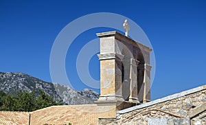 Bell tower of monastery Kera Kardiotissa in the mountains of Crete. Greece