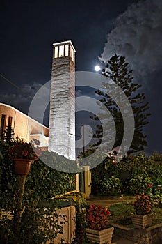 Bell tower in the night at moonlight