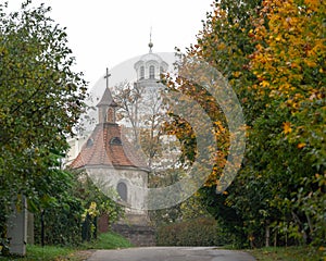 The bell tower of the old church in fall