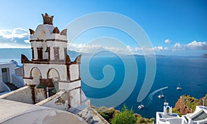 Bell tower of an orthodox church at Santorini, Greece. Honeymoon summer aegean cycladic background.