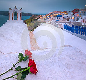 Bell tower of an orthodox church at Santorini, Greece. Honeymoon summer aegean cycladic background.