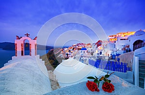 Bell tower of an orthodox church at Santorini, Greece. Honeymoon summer aegean cycladic background.