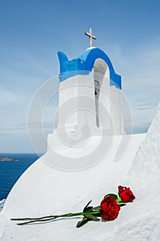 Bell tower of an orthodox church at Santorini, Greece. Honeymoon summer aegean cycladic background.