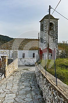 Bell Tower of Orthodox church with stone roof in village of Theologos,Thassos island, Greece