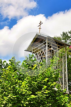 The bell tower in Orthodox parish of Saint Nicholas Church in the village of Saratovskaya