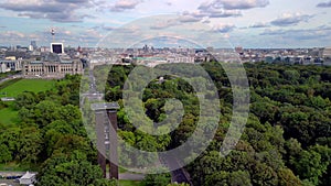 Bell tower park in front historical buildings. Perfect aerial view flight berlin