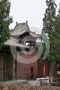 bell tower and pavilions in a buddhist monastery (shuanglin) closed to pingyao (china)