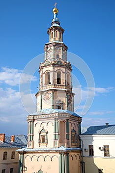 The bell tower of the Peter and Paul Cathedral on blue sky background close-up. Kazan