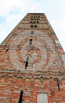 Bell tower of Pomposa Abbey a Benedictine monastery from below photo