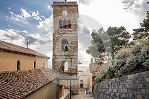 The Bell tower of Romanesque Pontifical Basilica of Santa Maria de Gulia, in Castellabate, italy. photo