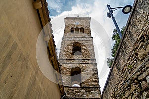The Bell tower of Romanesque Pontifical Basilica of Santa Maria de Gulia, in Castellabate, italy. photo