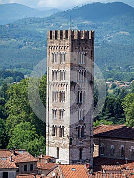 The bell-tower of San Frediano church. Lucca, Italy, seen from the Guinigi tower photo