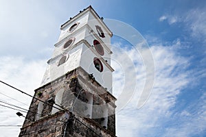 Bell tower of the San Sebastian Church built between 1553 and 1653 at the town of Mariquita in Colombia photo