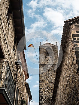 Bell tower of Sant Salvador Church in Castellfolit de la Roca wi