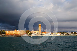 Bell tower of Sant'Elena Church and yacht harbor at extreme east end of sestiere of Castello in Venice, Italy. View photo