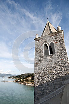 A bell tower, the sea and the sky