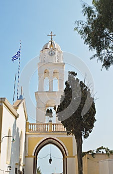 Bell tower of small church in Oia, Santorini island, Greece