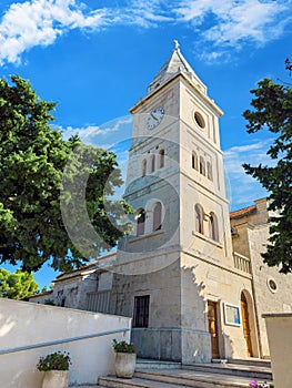 Bell tower of St. George Church in Primosten, Croatia.