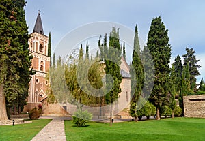 Bell tower and St. George`s church in Monastery of St. Nino at Bodbe. Sighnaghi. Georgia