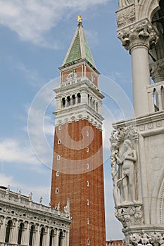 Bell Tower of St Mark and a statue of the palazzo ducale